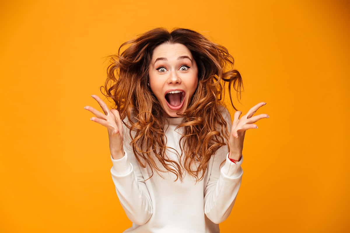Image,Of,Excited,Screaming,Young,Woman,Standing,Isolated,Over,Yellow