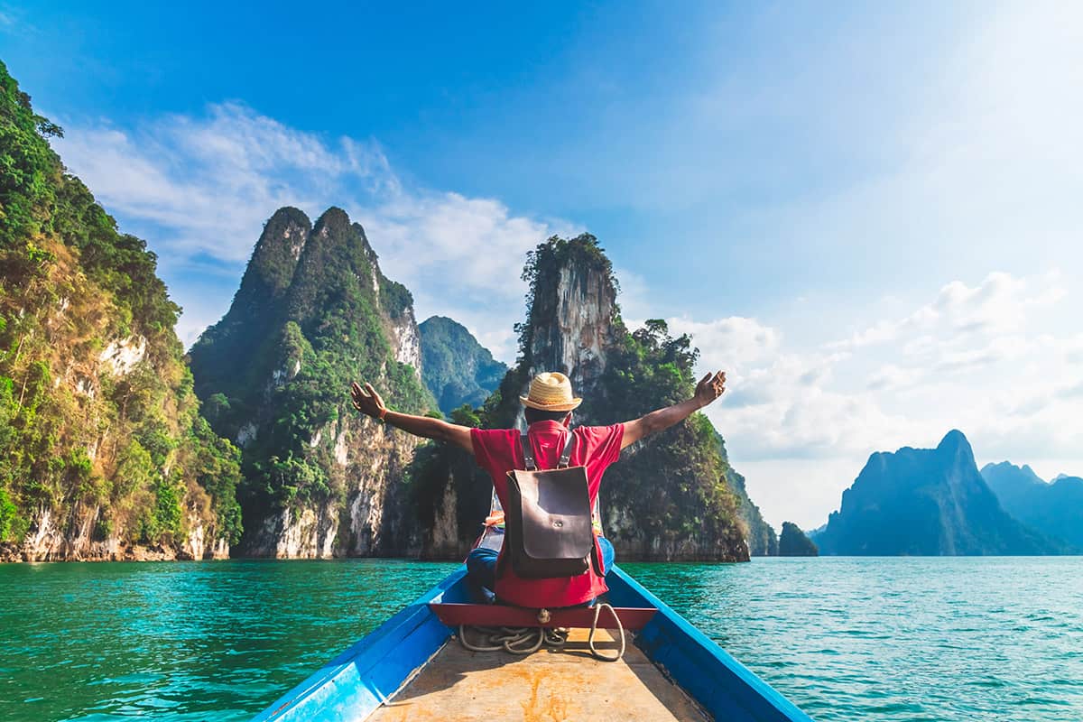 Man,Traveler,On,Boat,Joy,Fun,With,Nature,Rock,Mountain